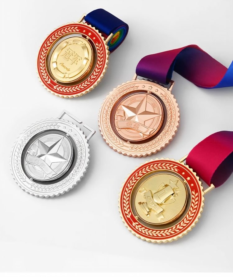 Gold silver and bronze rotating medal finishes Gold silver and bronze rotating medal finishes