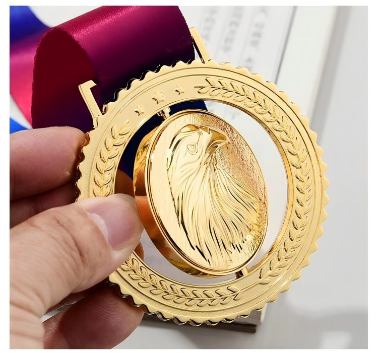 Rotating center feature on a custom metal medal Rotating center feature on a custom metal medal